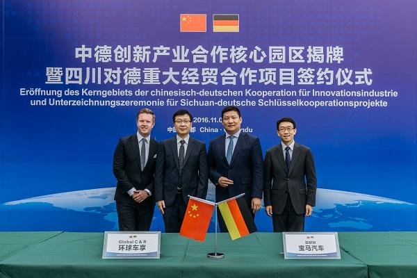 01.宝马(中国) 汽车贸易有限公司总裁刘智博士与环球车享汽车租赁有限公司总经理曹光宇博士签署合作意向书.jpg