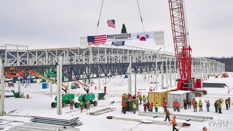 ironworkers-at-ultium-cells-llc-s-battery-cell-manufacturing-facility-mark-a-construction-milestone-friday-feb.-19-2021-with-the-final-beam-installation-at-what-will-soon-be-a-2.8-million-square-foot-operation-in-lor.jpg